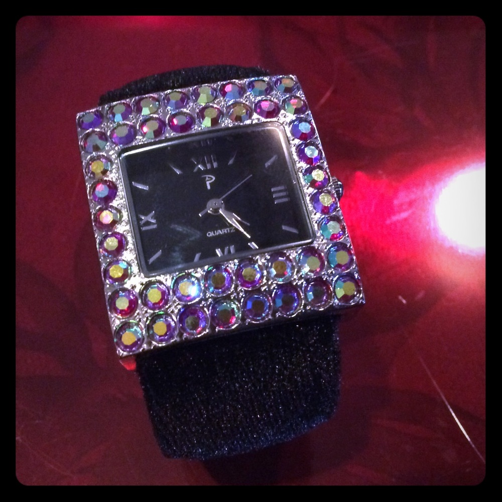 New P silver tone stone dec face bracelet watch.